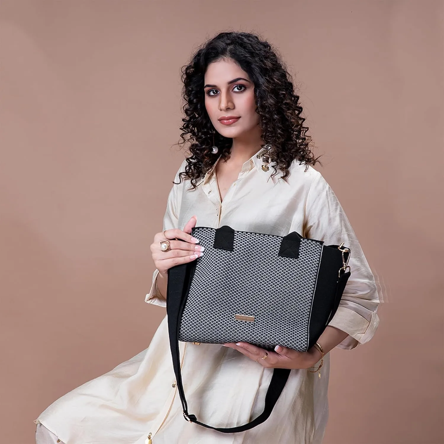 Handbag for Women & Girls | Stylish and spacious bag with premium metal fittings and crossbody strap.