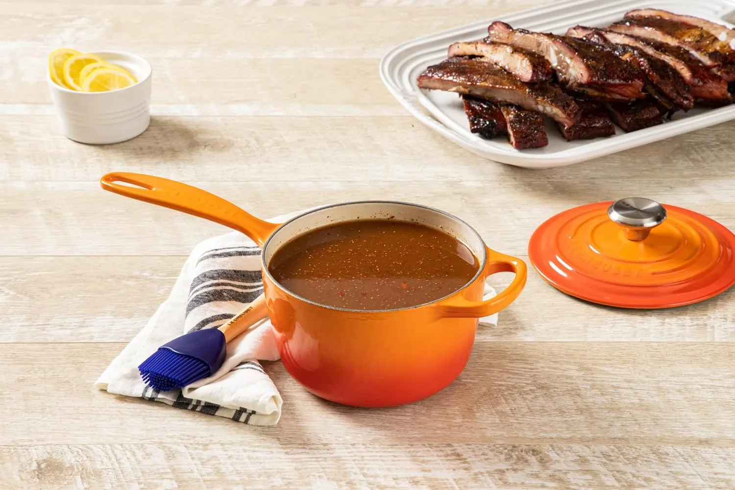 Le Creuset Enameled Cast Iron Signature Saucepan, 2.25 qt., Flame